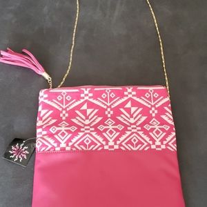 Pink white gold purse.
